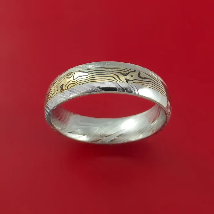 Kuro Damascus Steel Ring with 18k Yellow Gold Mokume Shakudo Inlay Custom Made Band Lashbrook Rings Kuro Damascus Steel Ring with 18k Yellow Gold Mokume Shakudo Inlay Custom Made Band Lashbrook Rings