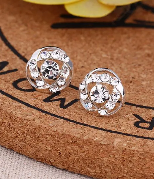 polly Earrings E295 Silver Rhinestone Swirl Earrings