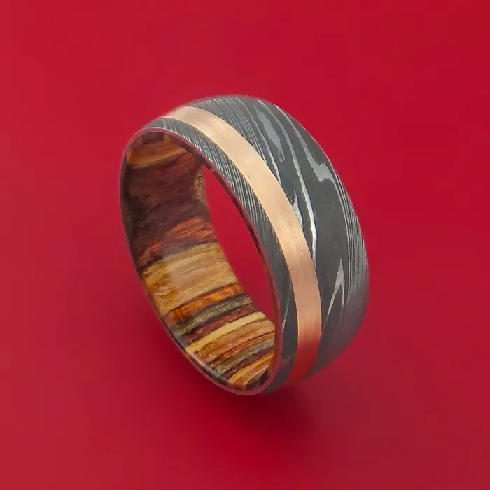 Rings Lashbrook Damascus Steel Ring with 14k Rose Gold Inlay and Interior Hardwood Sleeve Custom Made Band Rings Lashbrook Damascus Steel Ring with 14k Rose Gold Inlay and Interior Hardwood Sleeve Custom Made Band