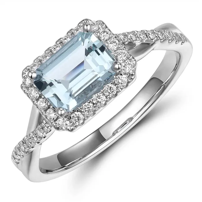 Meierotto Jewelers Rings 18K White Gold East to West Emerald Cut Aquamarine Ring with Diamond Halo and Crossover Shank